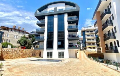 Ny treværelses lejlighed til salg i Oba Alanya 11