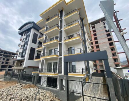 Nowe 2 pokojowe mieszkanie na sprzedaż w Mahmutlar Alanya 1