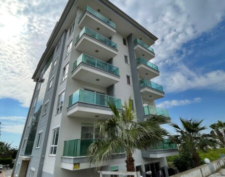 Umeblowane 3-pokojowe mieszkanie z widokiem na morze na sprzedaż w Kestel Alanya 1