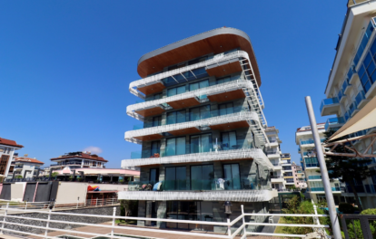 Luxuriöse 3-Zimmer-Wohnung am Strand zum Verkauf in Kestel Alanya 1