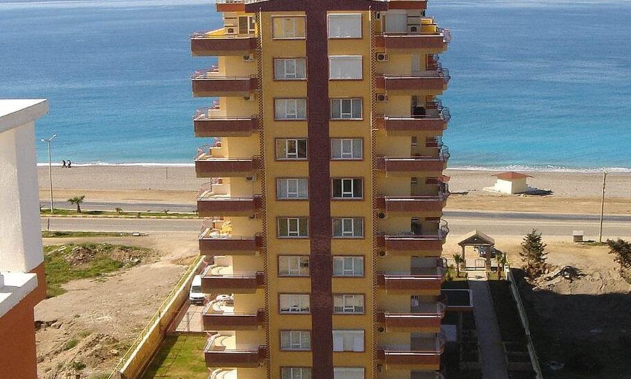 Möblierte 3-Zimmer-Wohnung direkt am Strand zum Verkauf in Mahmutlar Alanya 1